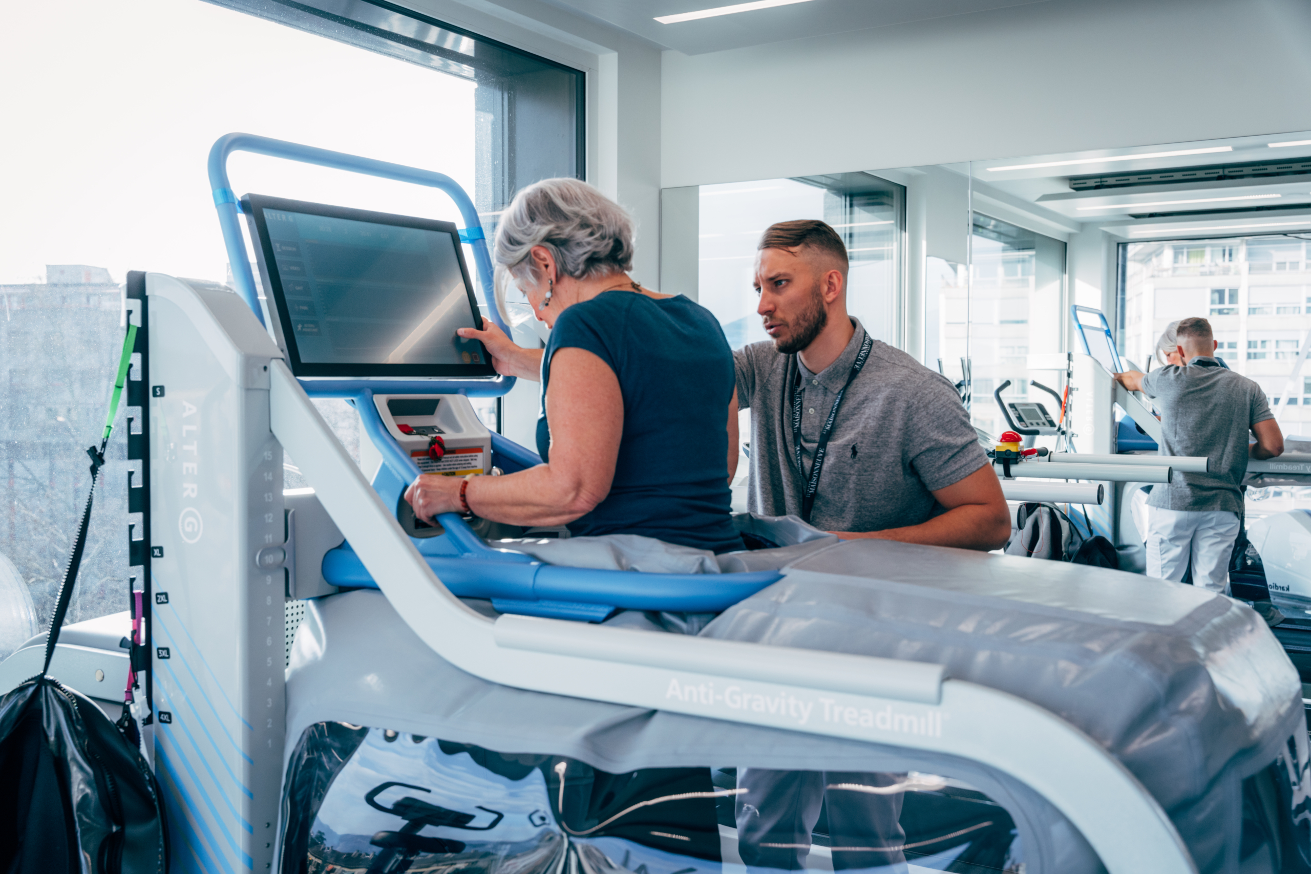 Tapis de course Alter G, course avec jambes submergée dans l'eau , traitement personnalisé